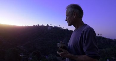 farmacy of light film - erik cutter with a cup of coffee